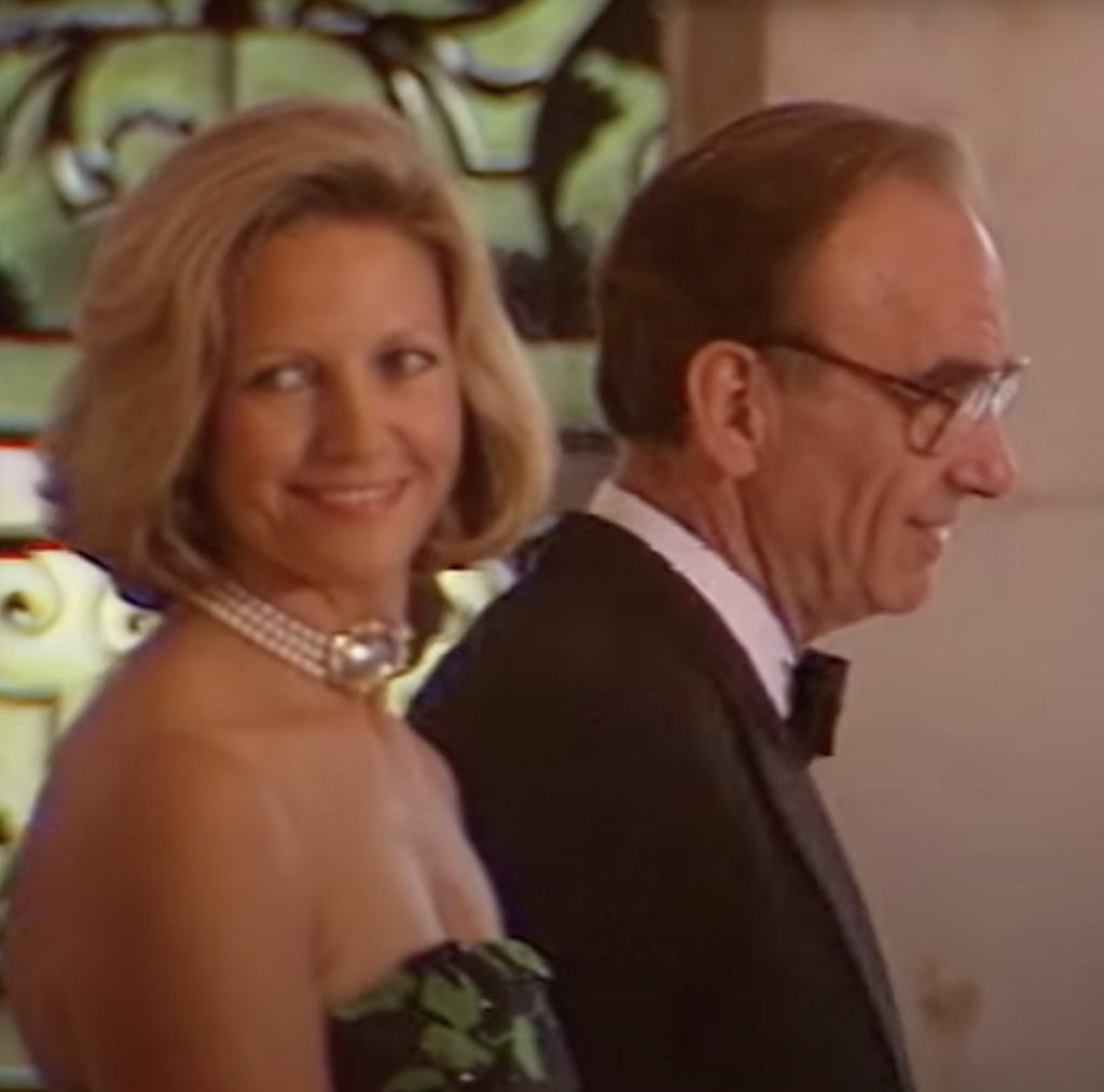 Anna Maria and Rupert Murdoch in 1985 at an event in at Hampton Court Palace, the UK, hosted by then-prince Charles and princess Diana. Screenshot from an ITN video.